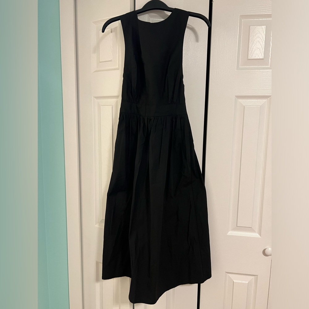 BNWT classic black dress with cross back, size S